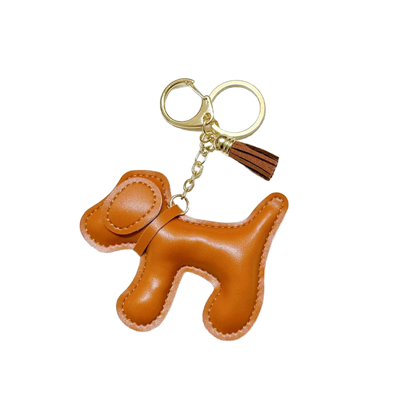 1 件卡通小狗吊坠，适用于挂在包上、汽车钥匙链上或作为装饰吊坠使用。