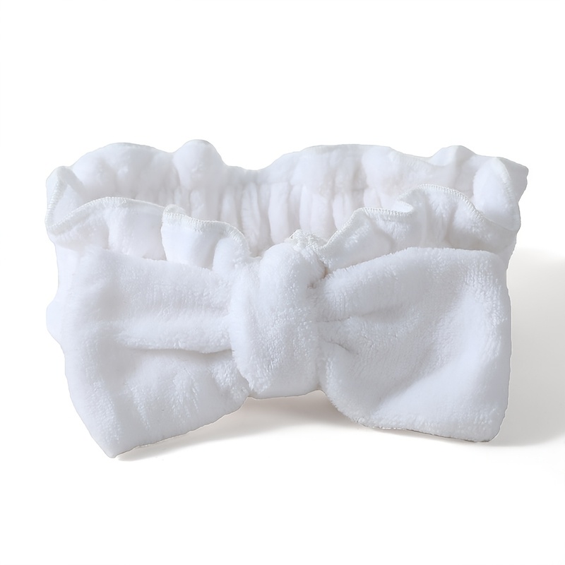 一件绒面蝴蝶结束发带 适用于护肤 化妆 洗漱束发 柔软亲肤不勒头 甜美风格打造清爽护理场景