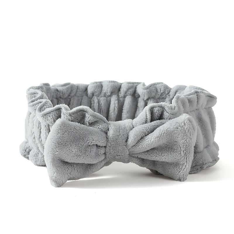 一件绒面蝴蝶结束发带 适用于护肤 化妆 洗漱束发 柔软亲肤不勒头 甜美风格打造清爽护理场景