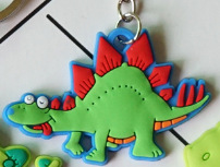 跨境爆款恐龙箱包挂件 儿童派对玩具 硅胶软胶钥匙扣厂家礼品现货