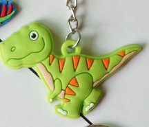跨境爆款恐龙箱包挂件 儿童派对玩具 硅胶软胶钥匙扣厂家礼品现货