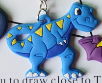 跨境爆款恐龙箱包挂件 儿童派对玩具 硅胶软胶钥匙扣厂家礼品现货