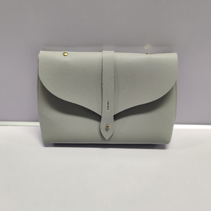 厂家直销皮革随手包ins方型纽扣出行女士手拿包便携单肩