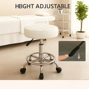 一款带可调节高度的圆形美容凳，配有坚固金属底座，专为专业水疗中心和理发店设计，适用于美容沙龙、酒吧、卧室及客厅等多种场景，灵活适配各类环境。