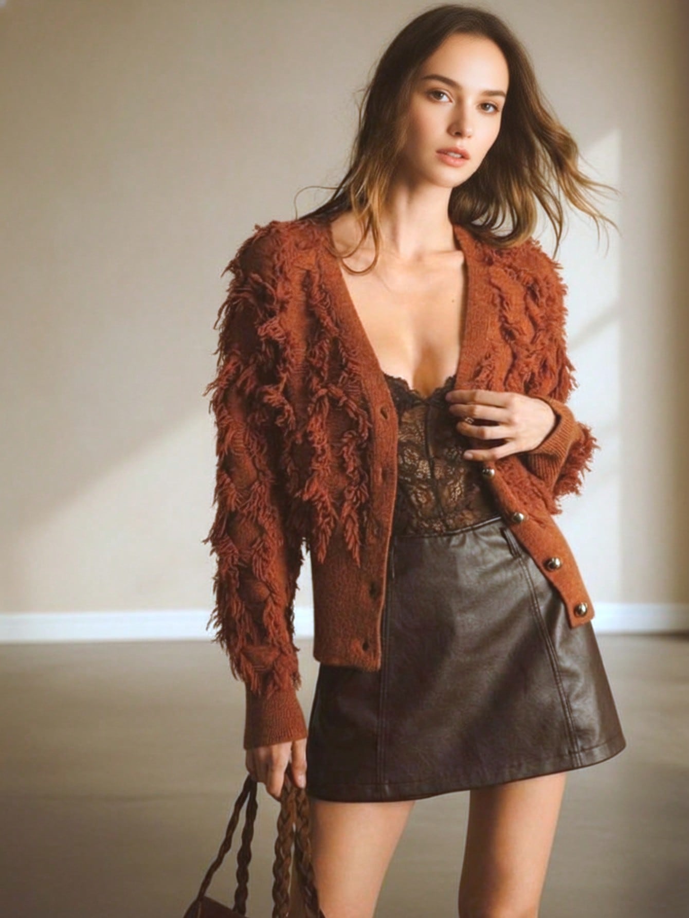 Women's Spring and Autumn knitted cardigan short design sense tassel sweater top