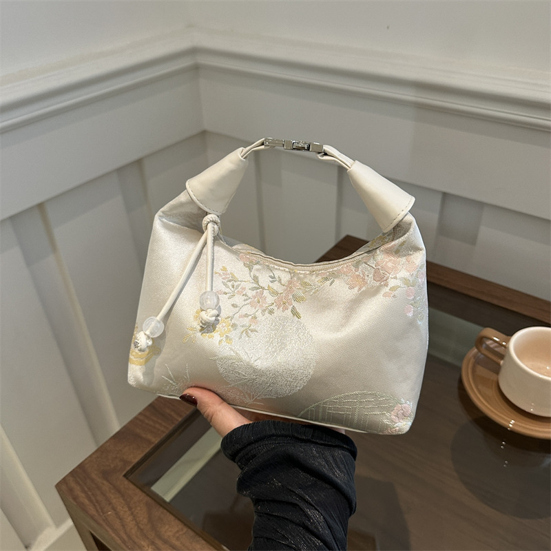 New Chinese style embroidery bag women's new summer commuter messenger bag niche antique hand bucket bag