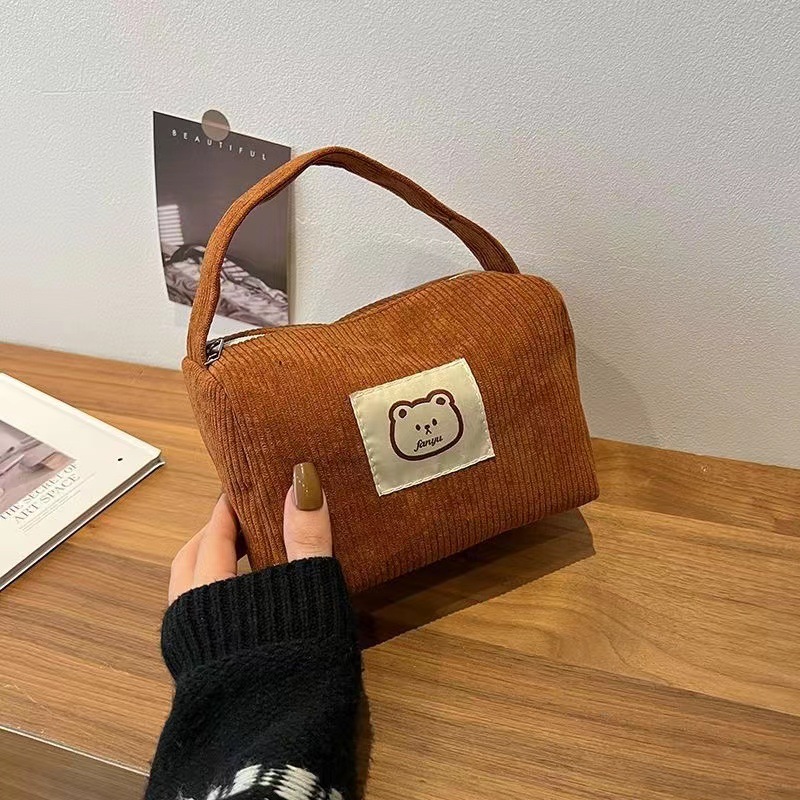 New corduroy portable cosmetic bag for female students Korean-style cute out-of-town handbag for female large-capacity wash bag fashion