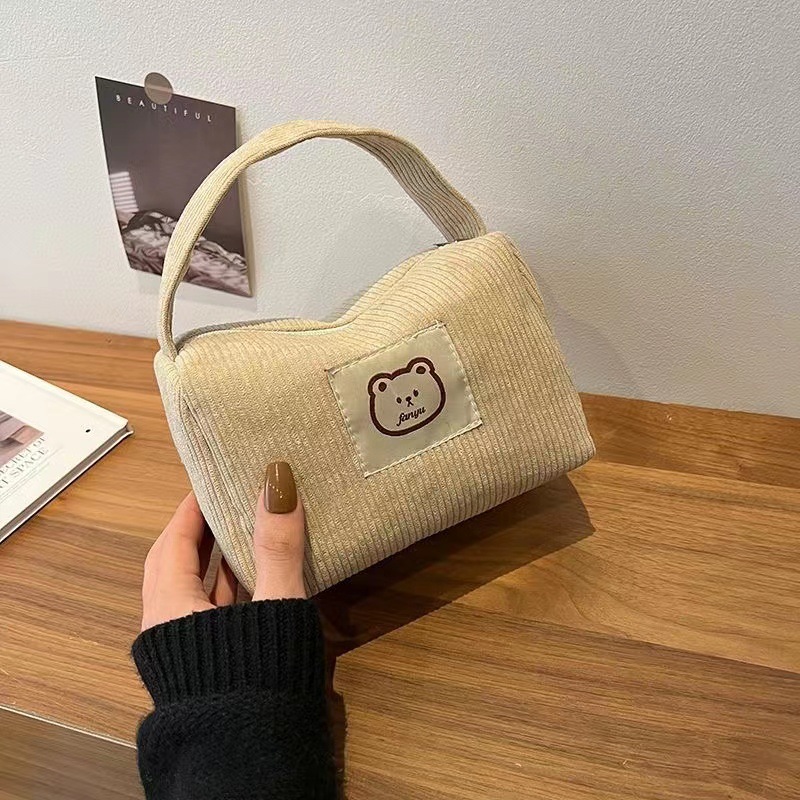 New corduroy portable cosmetic bag for female students Korean-style cute out-of-town handbag for female large-capacity wash bag fashion